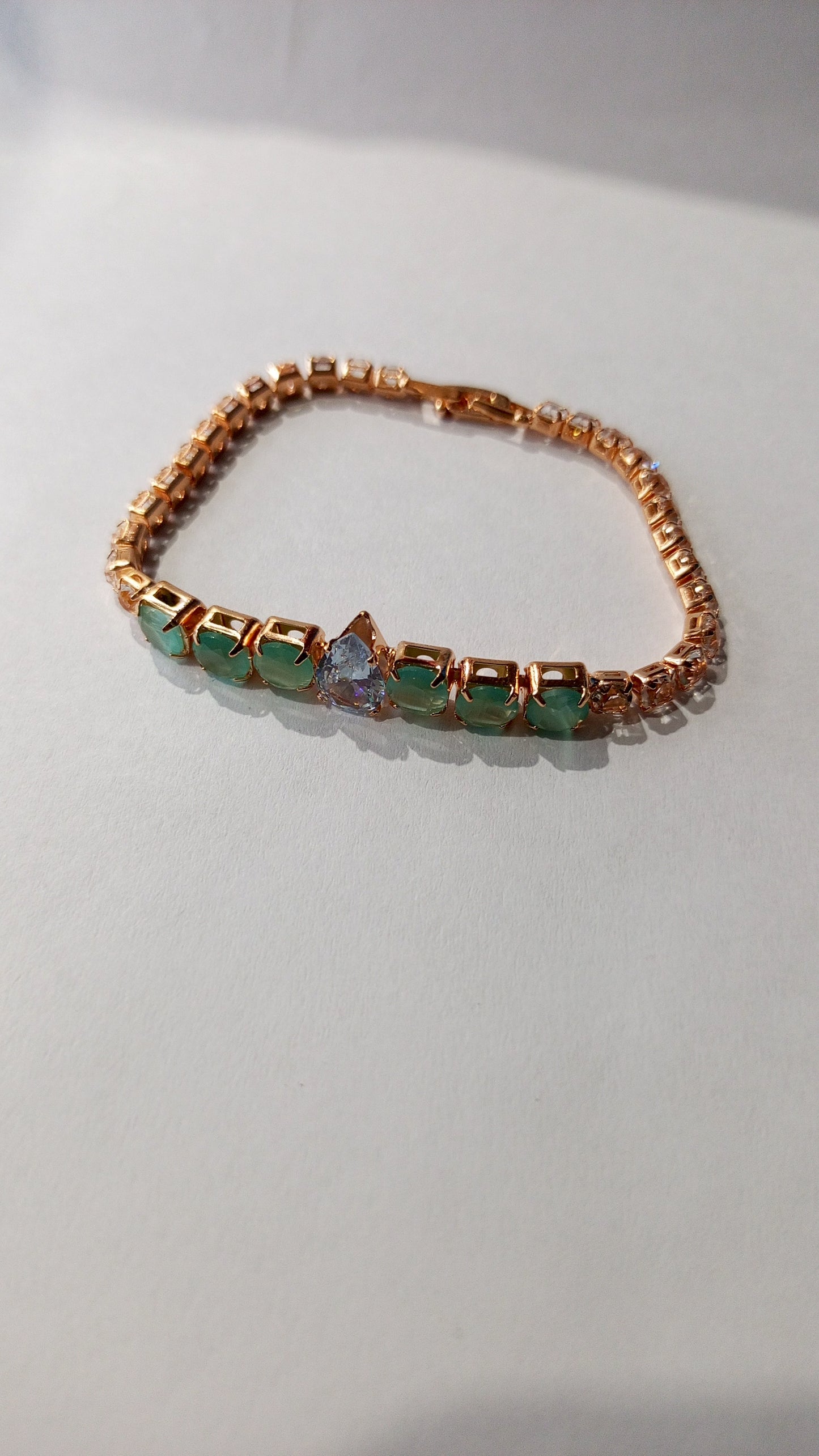 Elegant Rose Gold Green Stone Tennis Bracelet with Teardrop Accent