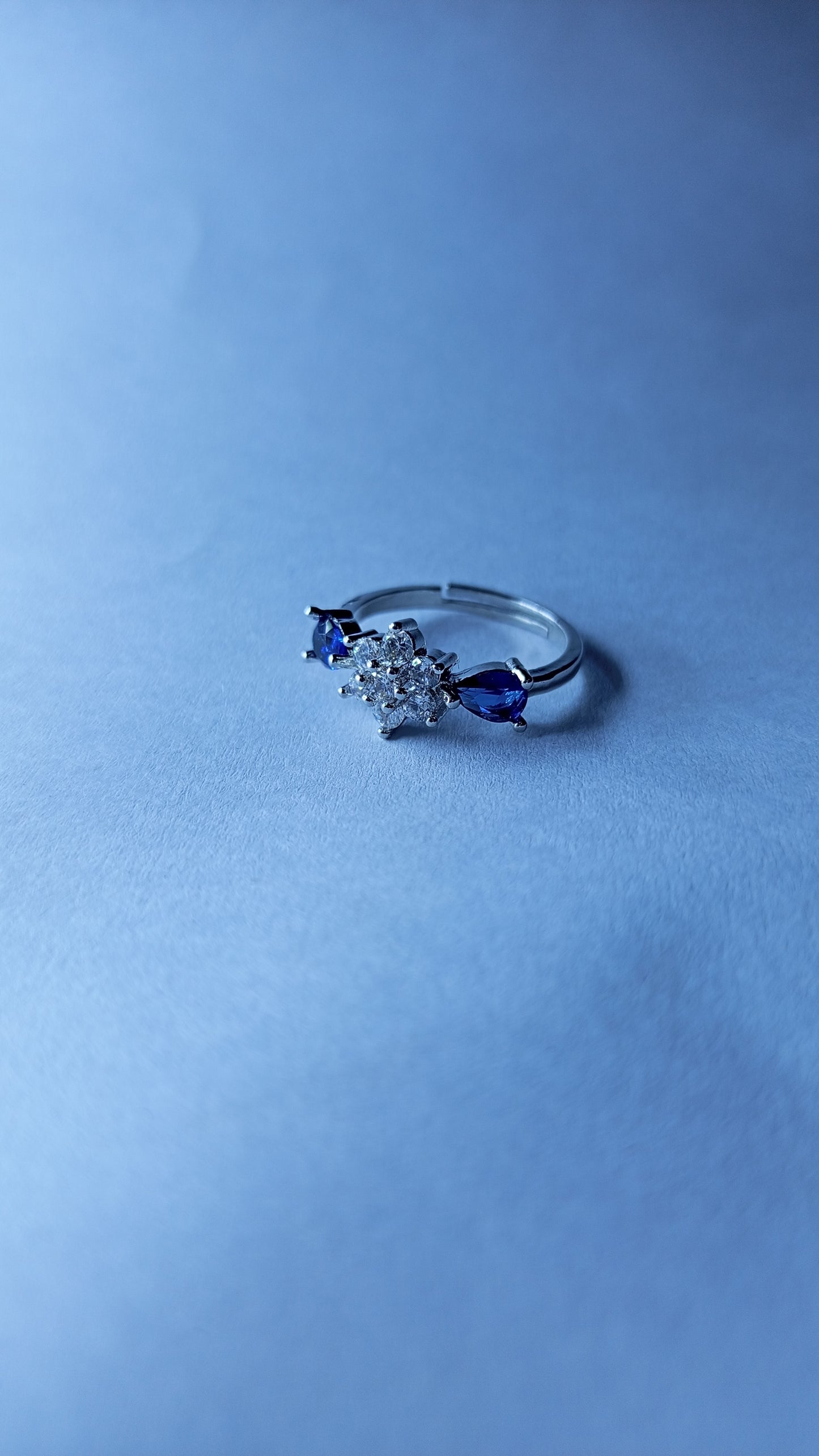 Silver Floral Zircon Ring with Sparkling Teardrop Accents
