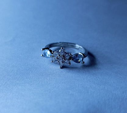 Silver Floral Zircon Ring with Sparkling Teardrop Accents