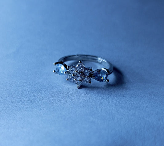 Silver Floral Zircon Ring with Sparkling Teardrop Accents